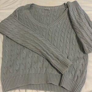 Pacsun’s kinit sweater. Light blue V neck.
